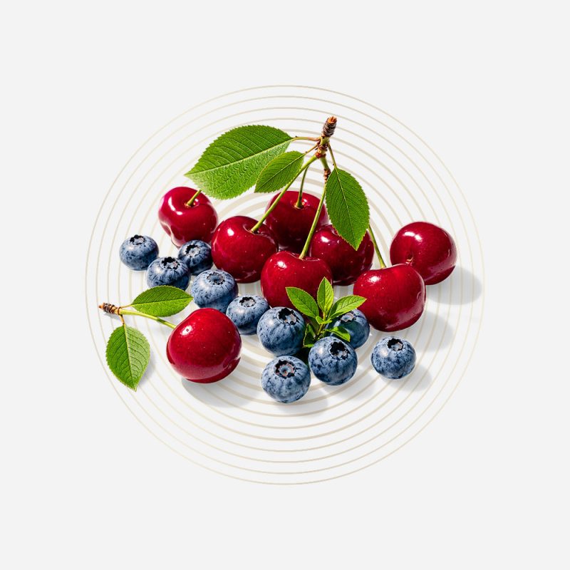 Fresh cherries and blueberries for natural health and wellness.